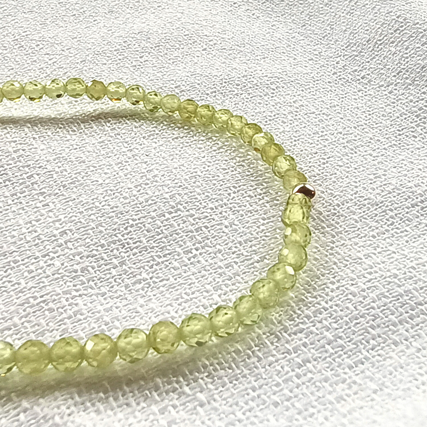 Peridot Olivin Armband Kugeln facettiert Ø 3mm