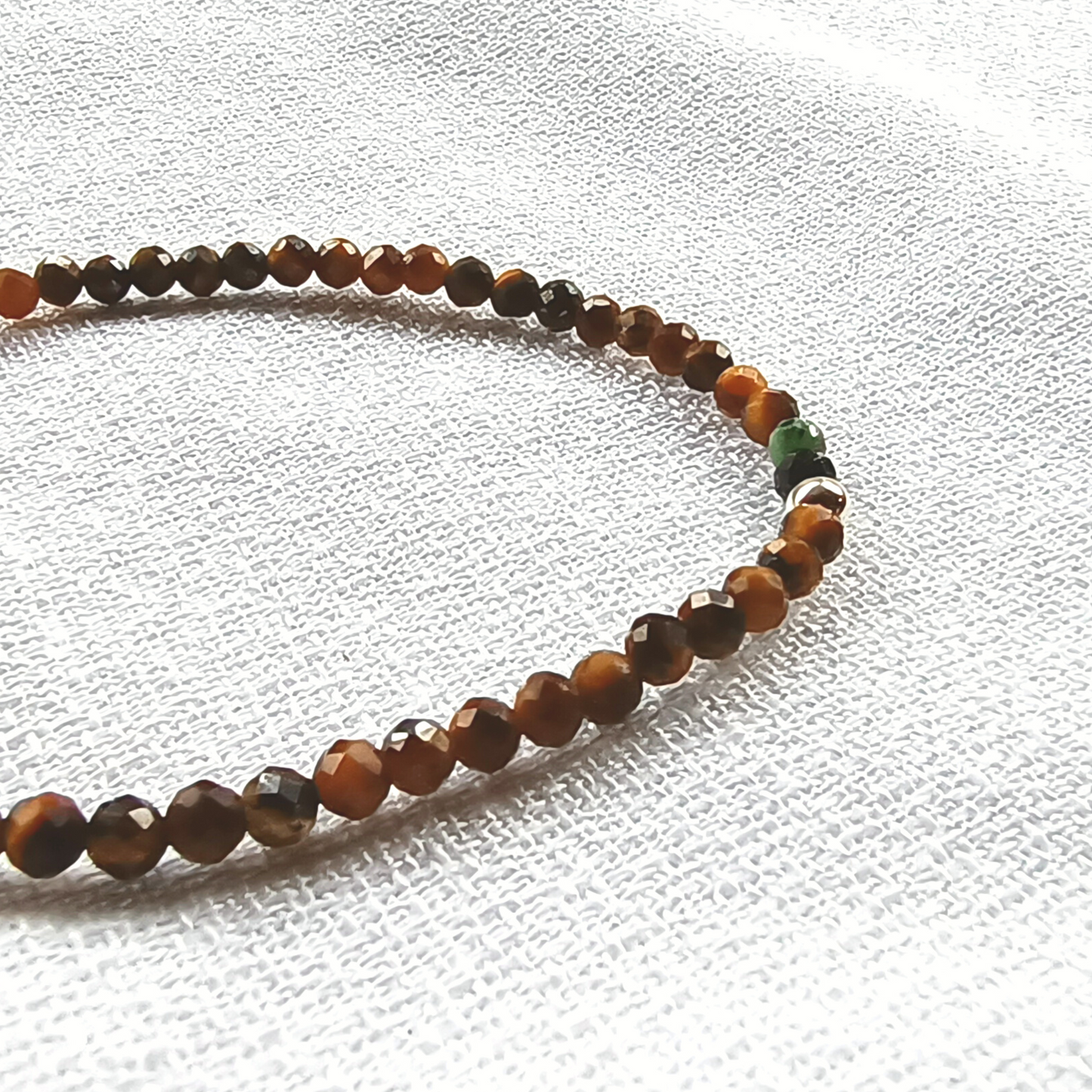 Tigerauge Armband Kugeln facettiert Ø 3mm