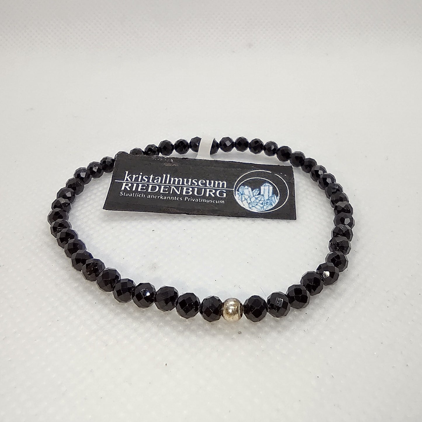 Armband aus facettierten, schwarzen Onyx-Kugeln