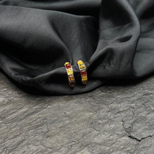 Bernstein Ohrstecker als Creolen